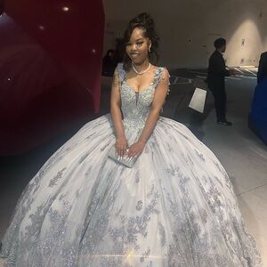 Elegant Silver Ball Gown with Floral Details